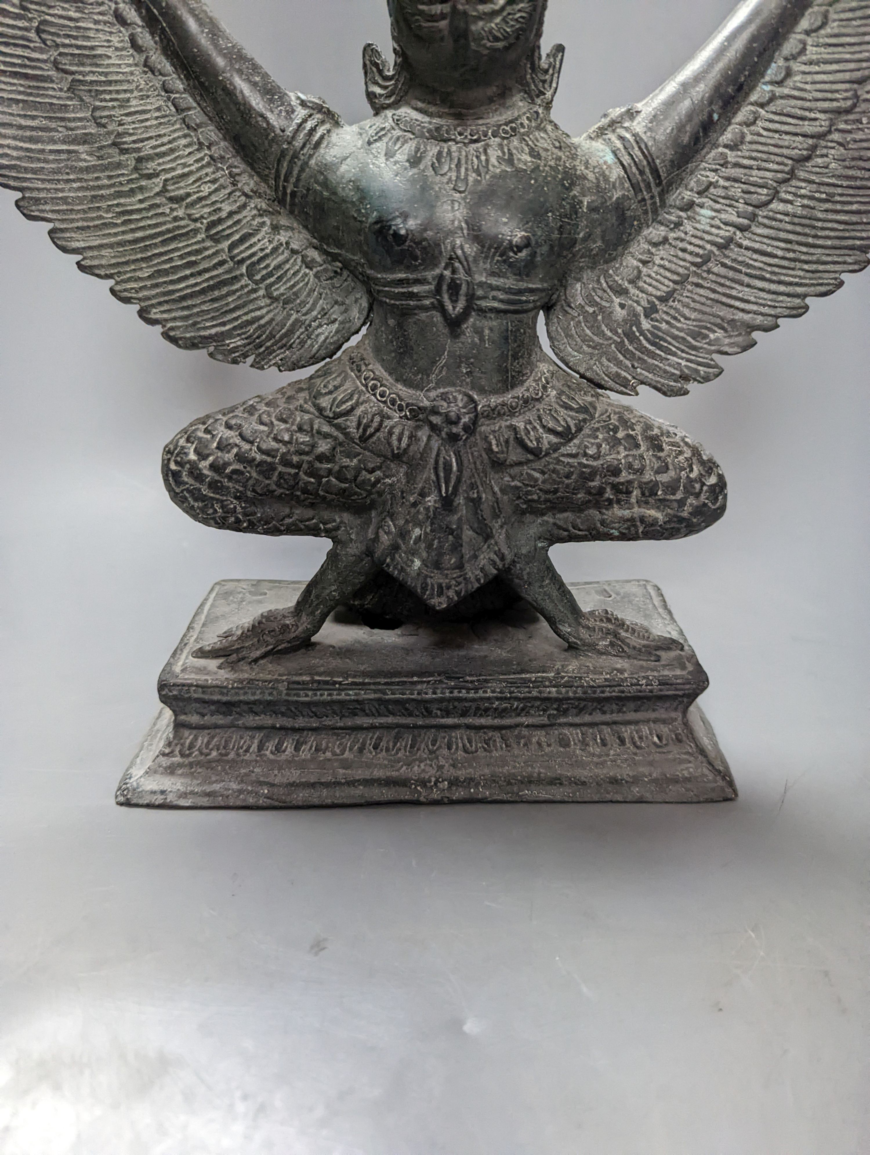 A south East Asian bronze model of a Garuda 32cm